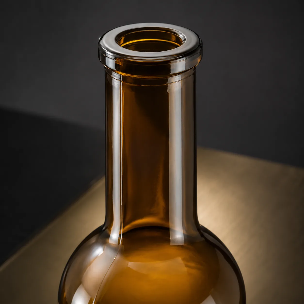 Close view of Amber Glass Dorica Oil Bottle showing label area and print / coat / label