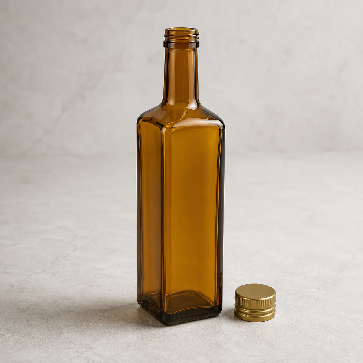 Angled side view of Amber Glass Marasca Oil Bottle showing the outer profile