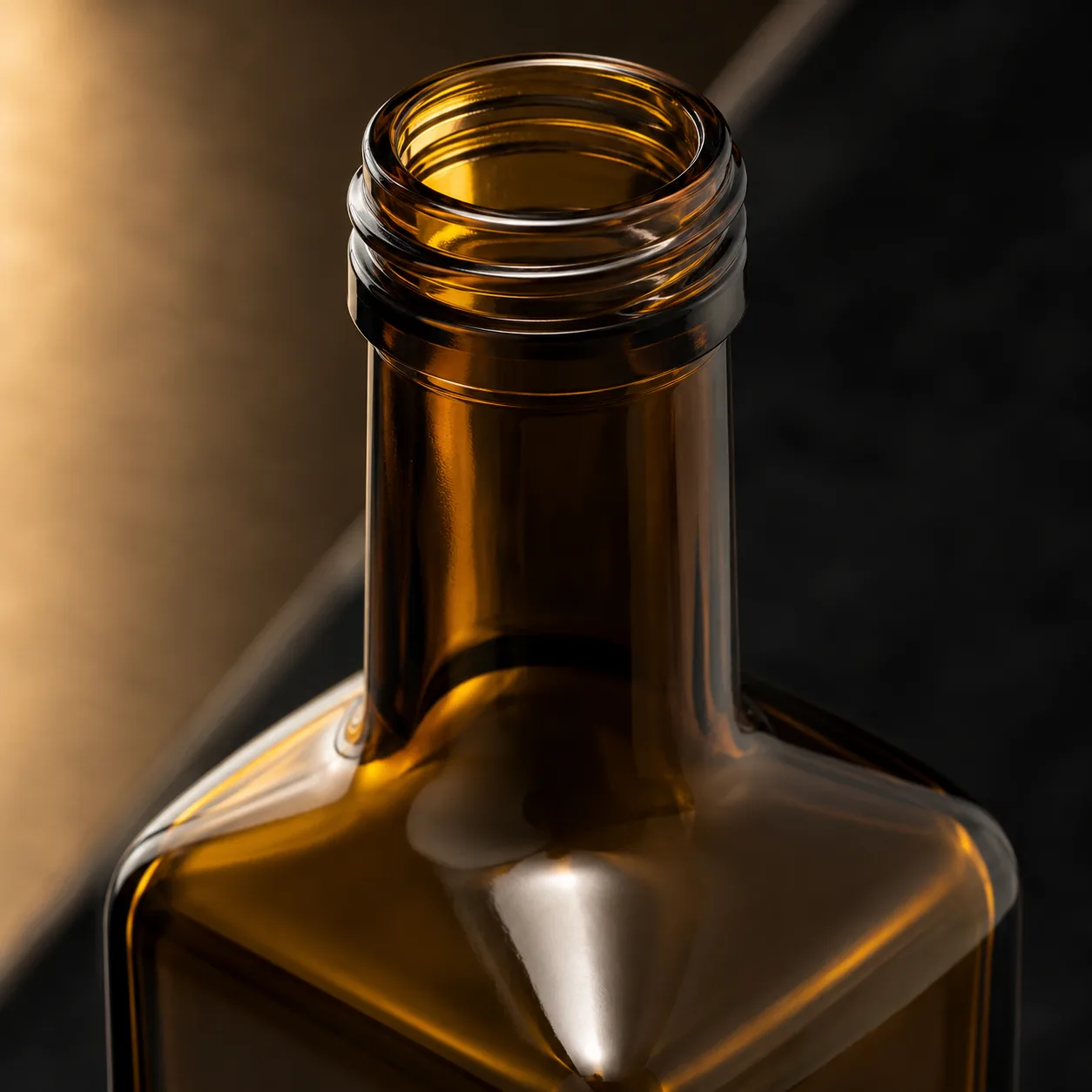 Close view of Amber Glass Marasca Oil Bottle showing label area and print / coat / label