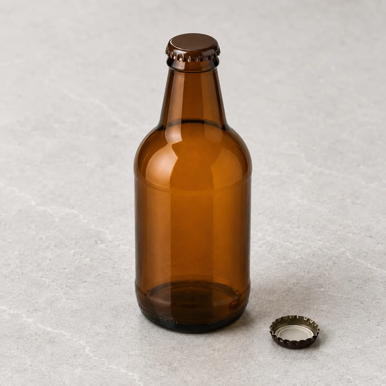 Angled side view of Amber Glass Stubby Beer Bottle showing the outer profile