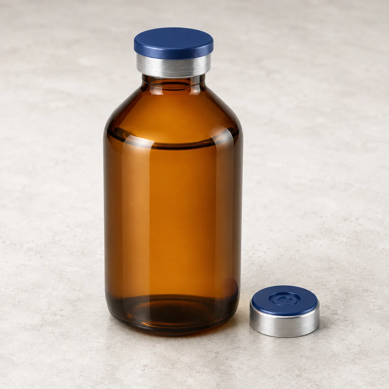 Angled side view of Amber Round-Shoulder Glass Bottle showing the outer profile