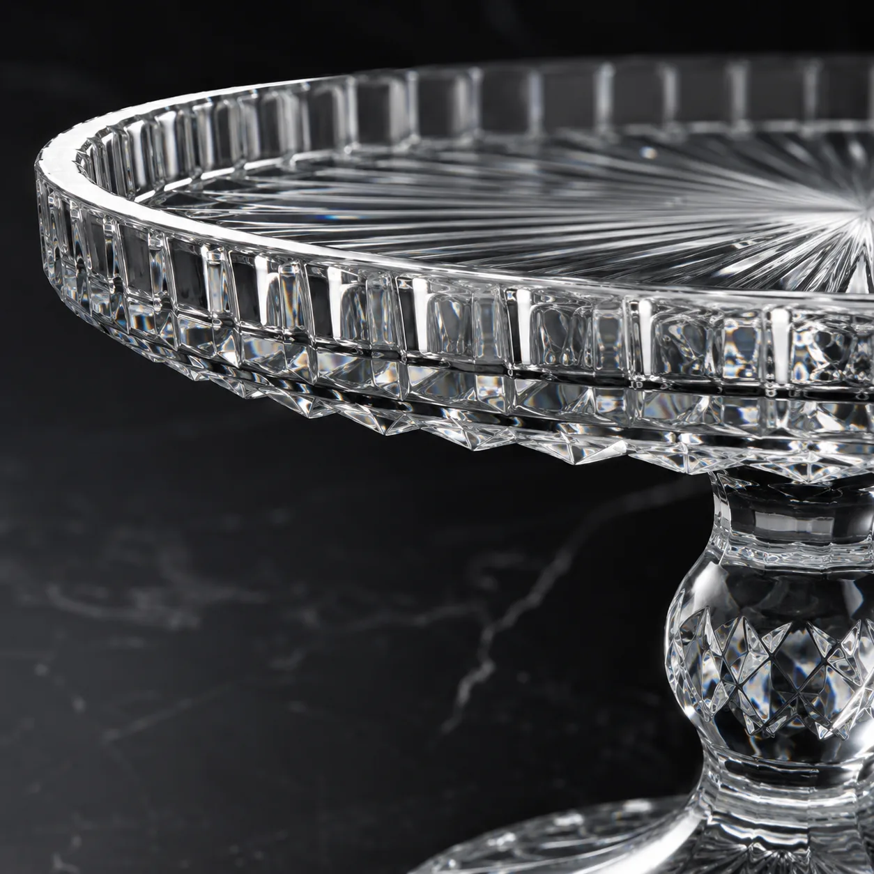 Close view of Cut Glass Cake Stand showing base detail and faceted surface detail