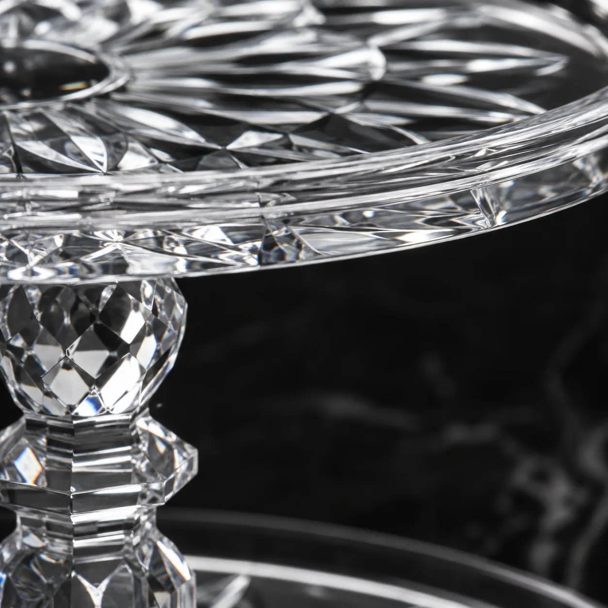 Close view of Cut Glass Dessert Stand showing base detail and faceted surface detail