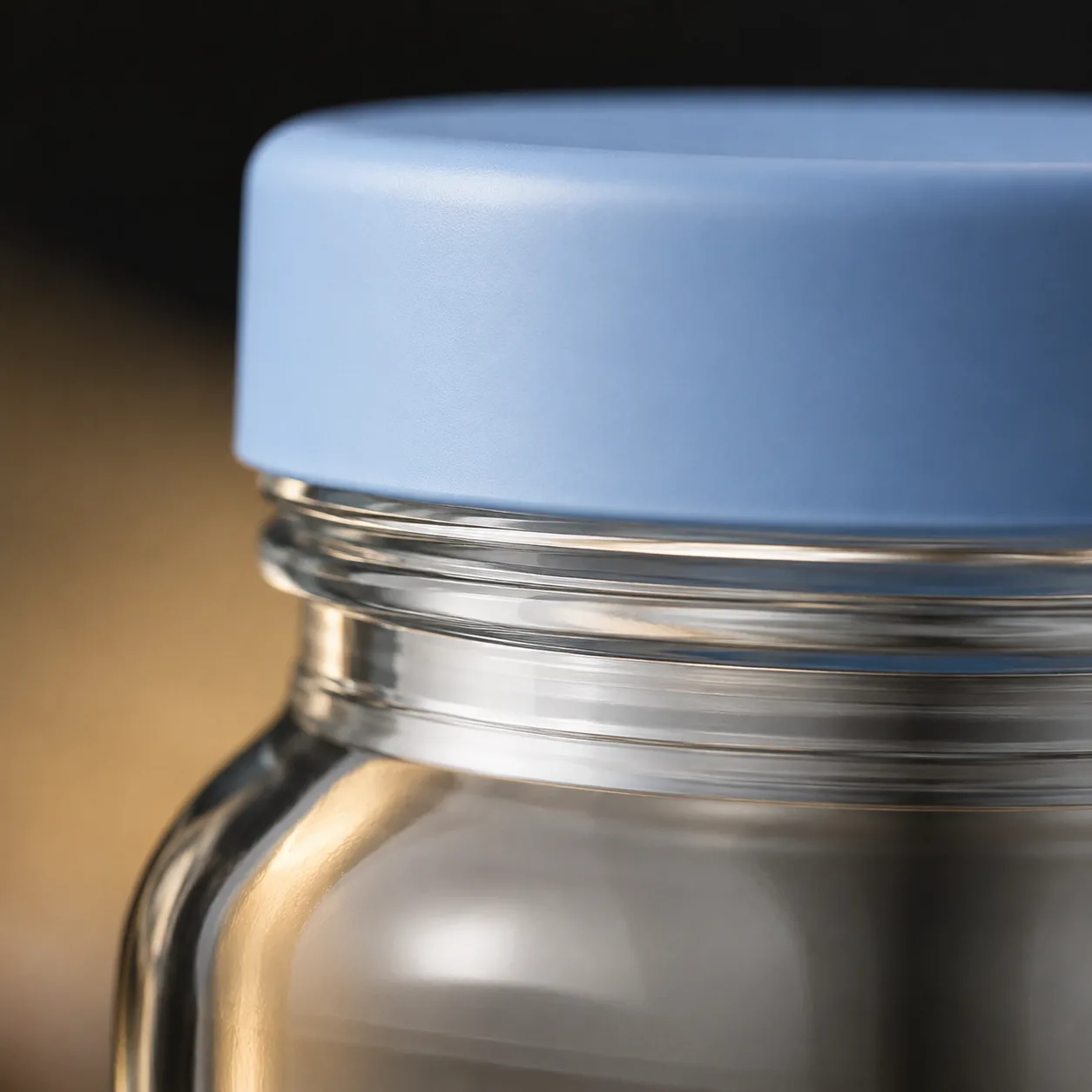 Close view of Baby Food Jar showing glass wall and label / lid branding