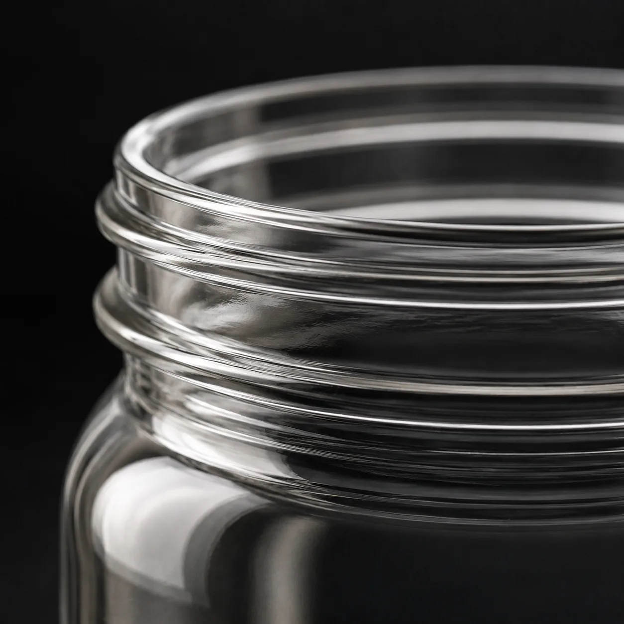 Close view of Canning Jar showing glass wall and label / lid branding