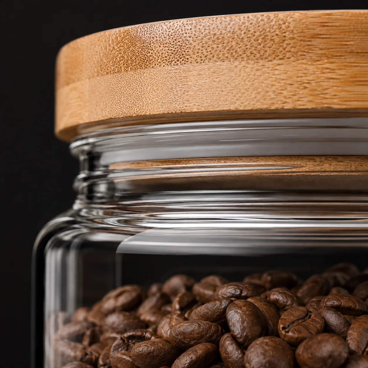 Close view of Coffee Storage Jar showing glass wall and label / lid branding