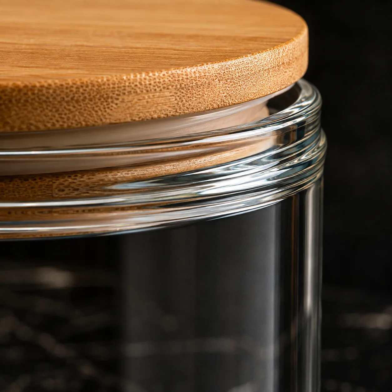 Close view of Dry Food Storage Jar showing glass wall and label / lid branding