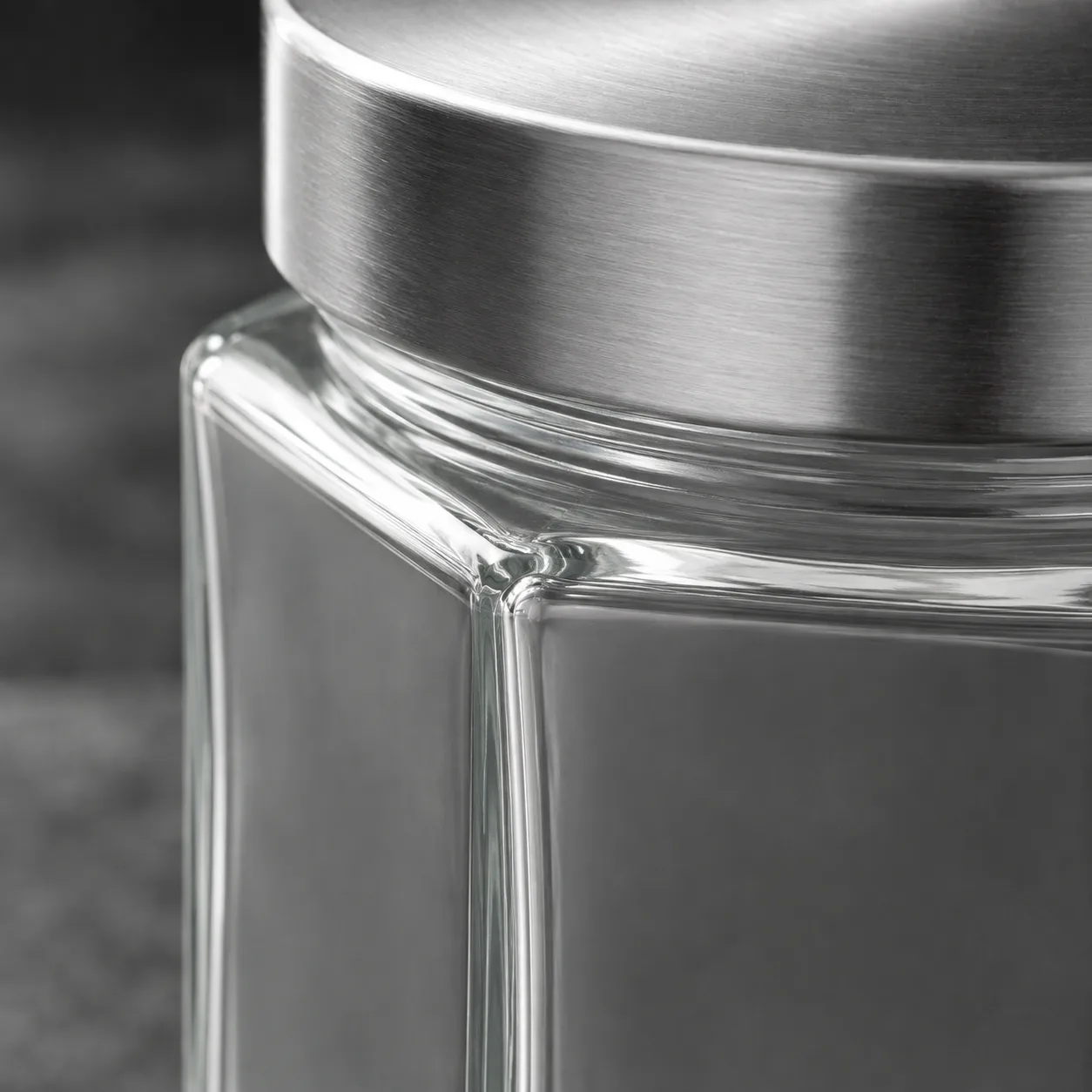 Close view of Hexagon Food Jar showing glass wall and label / lid branding