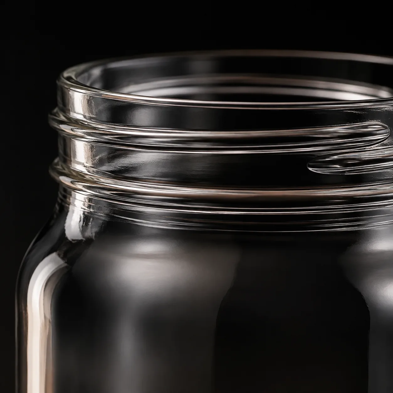 Close view of Mason Jar showing glass wall and label / lid branding