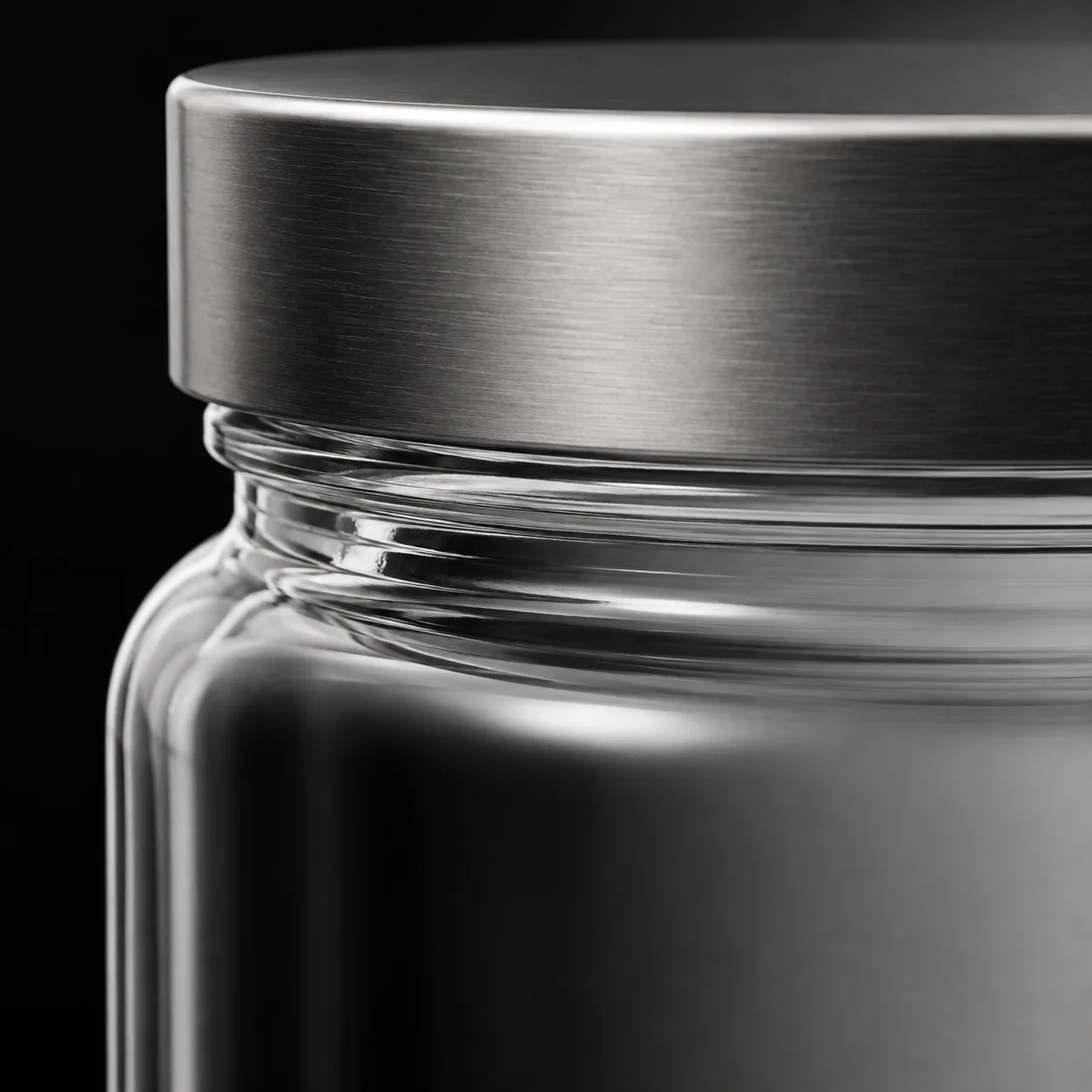 Close view of Round Food Jar showing glass wall and label / lid branding