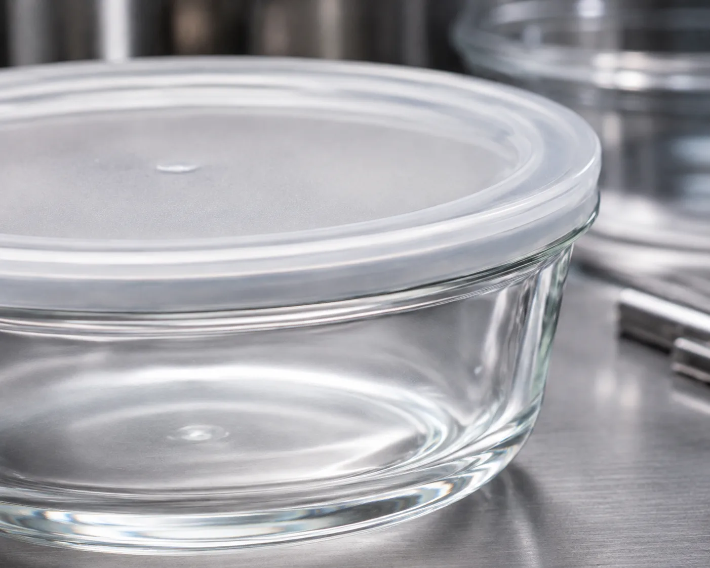 Round Glass Food Storage Bowl in a coordinated pantry or meal-preparation display.