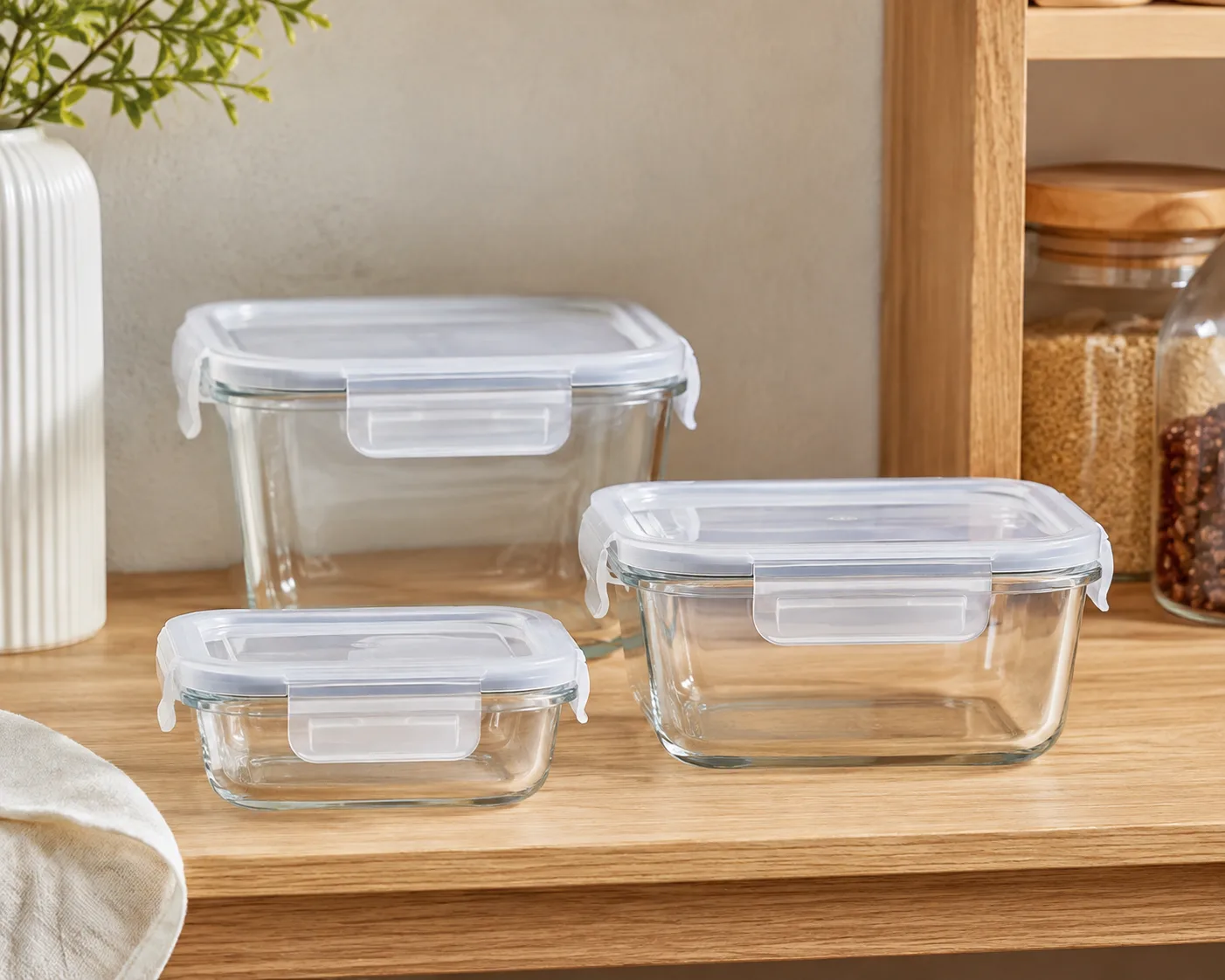 Close-up of Square Glass Food Storage Container showing the glass body, rim and base detail.