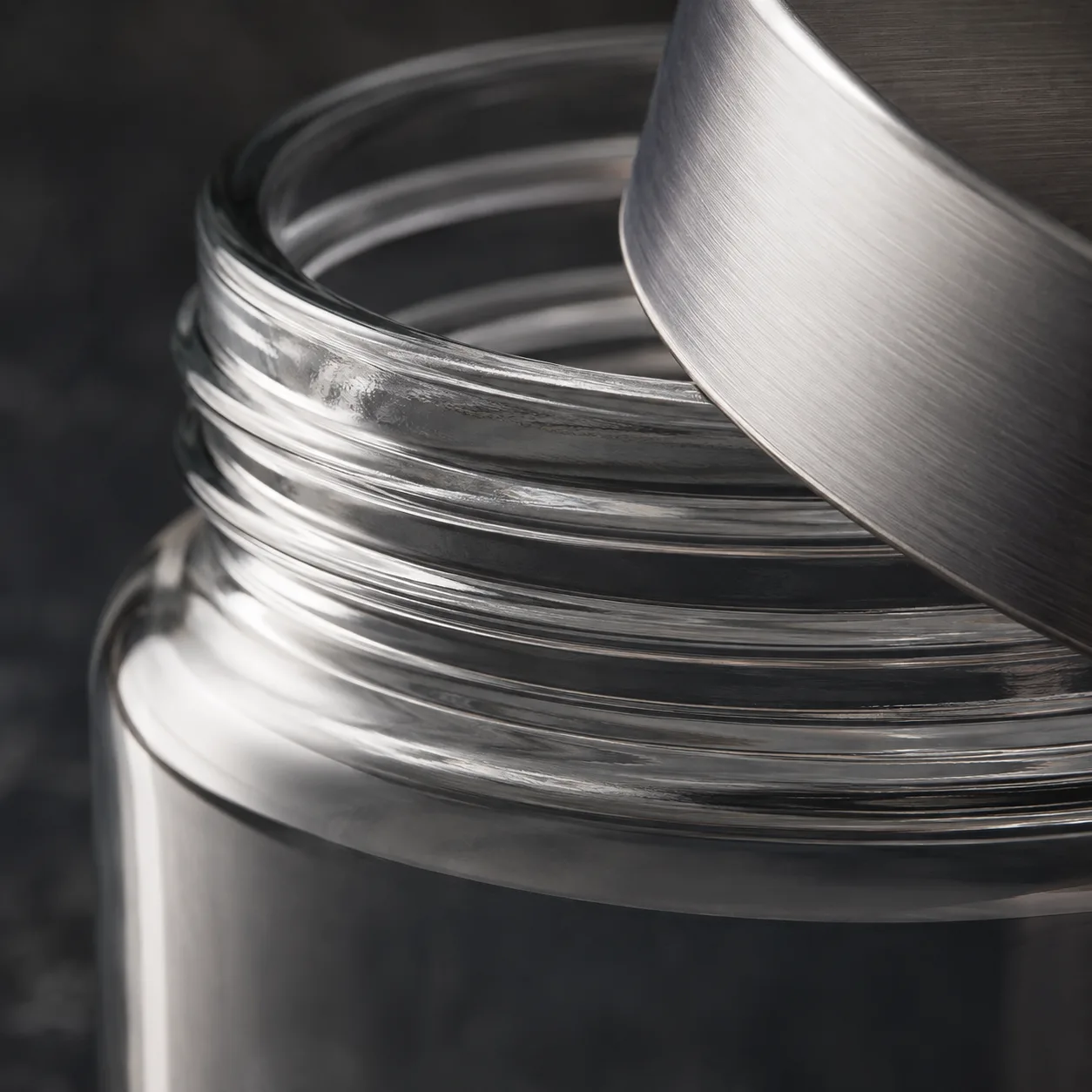 Close view of Wide-Mouth Food Jar showing glass wall and label / lid branding
