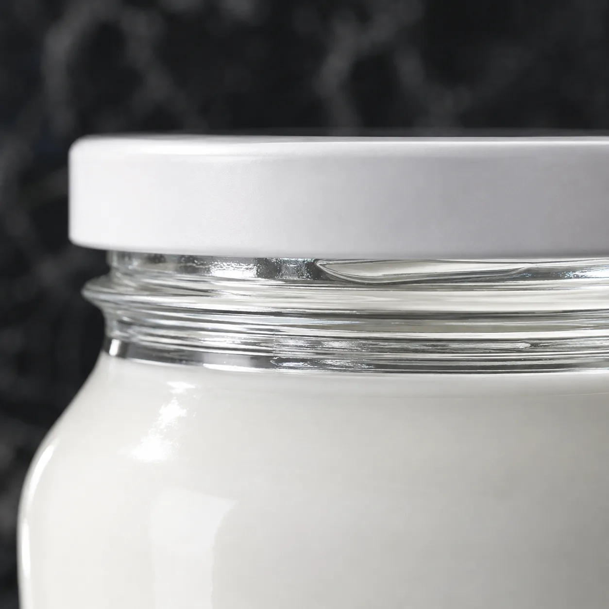 Close view of Yogurt Jar showing glass wall and label / lid branding