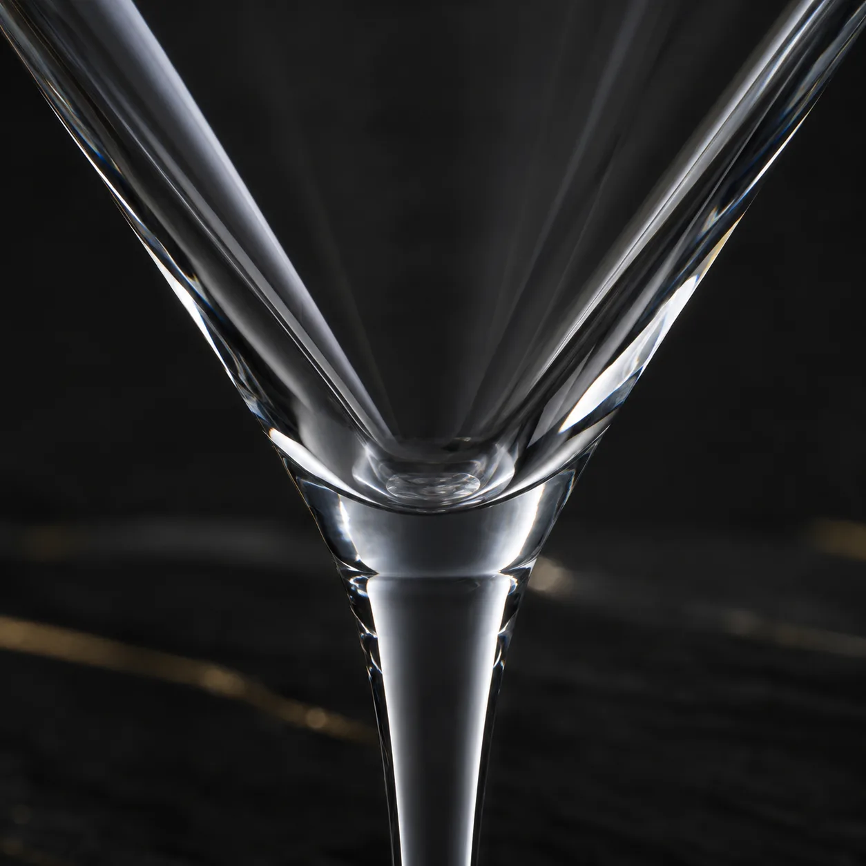 Close view of Martini Glass showing stem or base and logo print / decal