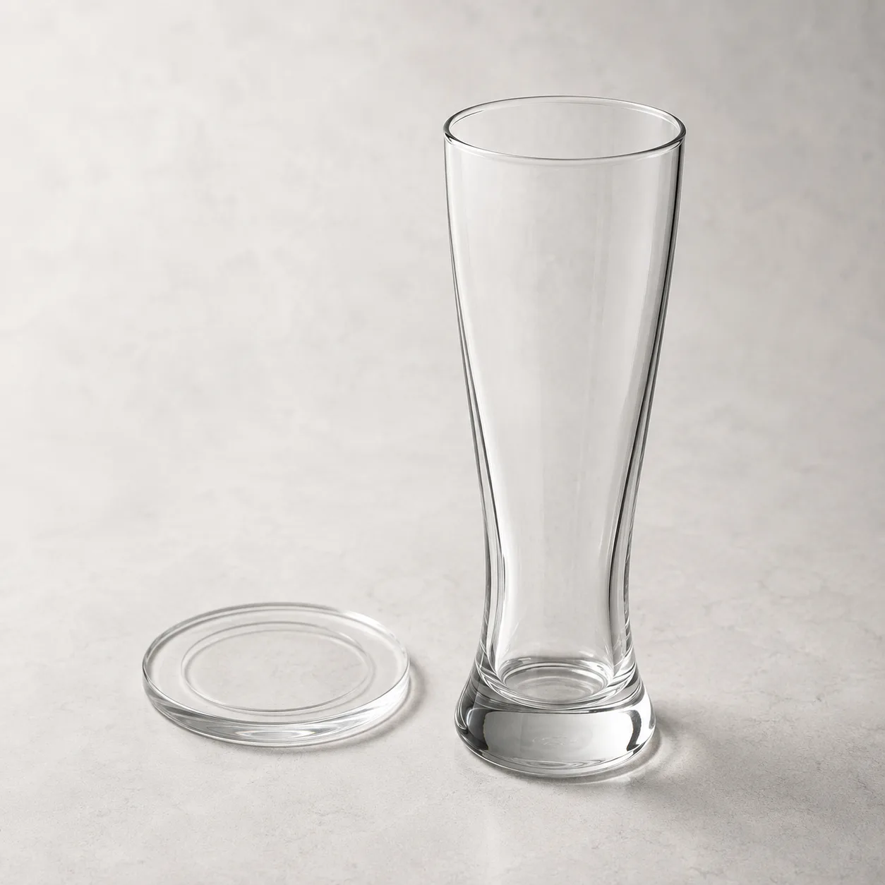 Close view of Pilsner Beer Glass showing stem or base and logo print / decal