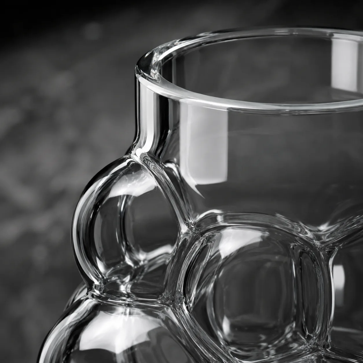 Detail view of Glass Bubble Vase showing rim or base detail