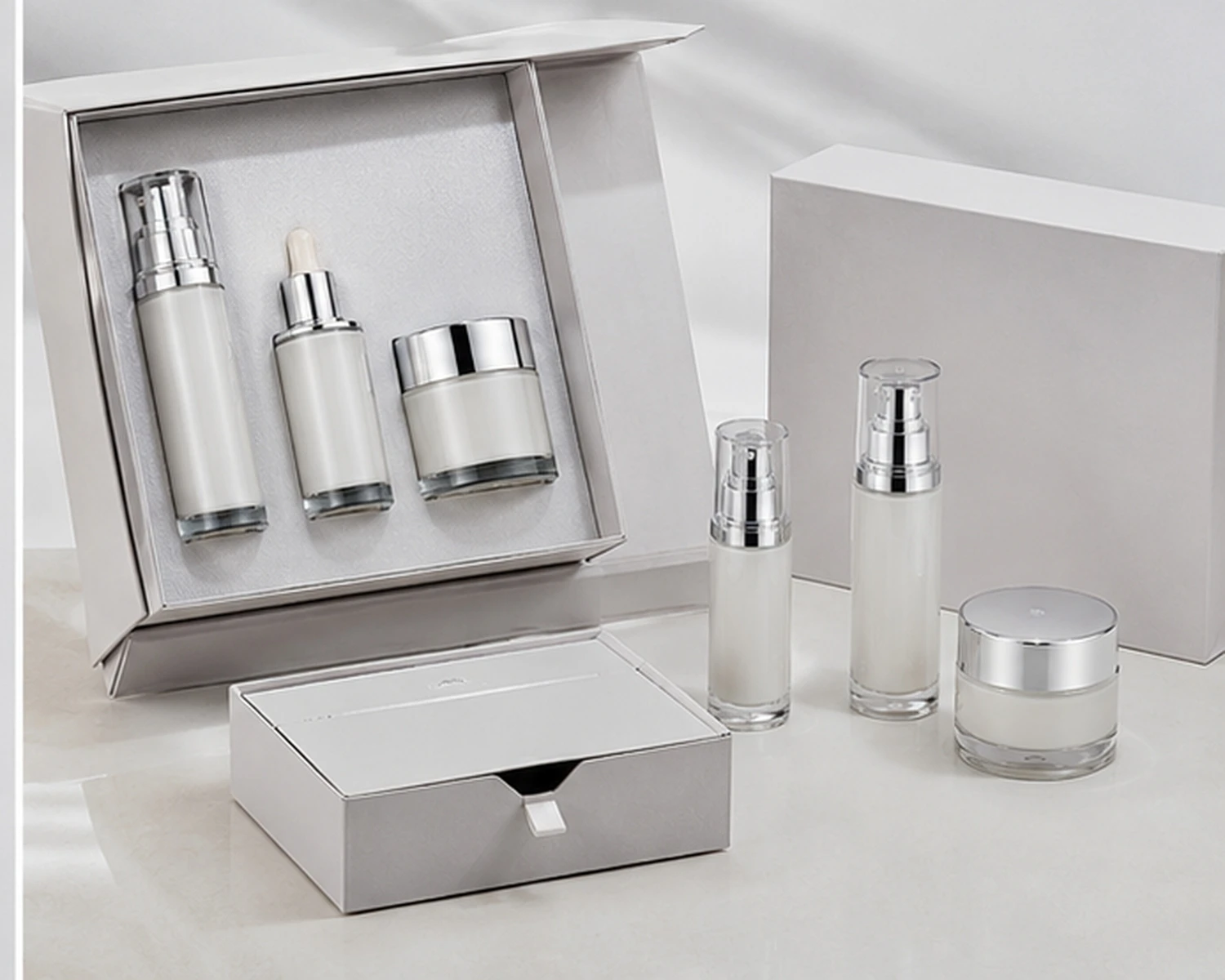 Geschenkbox-Verpackungsbild des zylindrischen Serumflaschen- und Cremetiegel-Sets mit Premium-Kosmetik-Verkaufskartonpräsentation